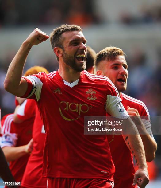 Rickie Lambert of Southampton celebrates with Luke Shaw as he scores their first goal during the Barclays Premier League match between Swansea City...