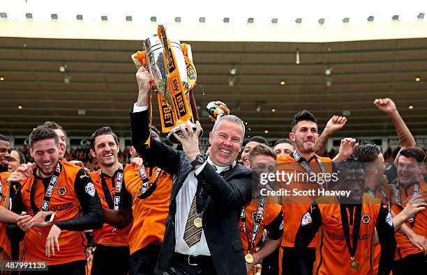 Wolves manager Kenny Jackett lifts the Sky Bet League One trophy during the Sky Bet League One match between Wolverhampton Wanderers and Carlisle...