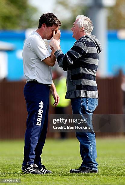 Bristol manager Darrell Clarke is comforted after his team are relegated during the Sky Bet League Two match between Bristol Rovers and Mansfield...