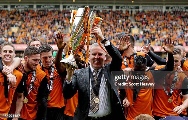 Wolves manager Kenny Jackett lifts the Sky Bet League One trophy during the Sky Bet League One match between Wolverhampton Wanderers and Carlisle...