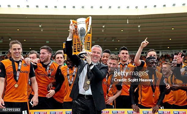Wolves manager Kenny Jackett lifts the Sky Bet League One trophy during the Sky Bet League One match between Wolverhampton Wanderers and Carlisle...