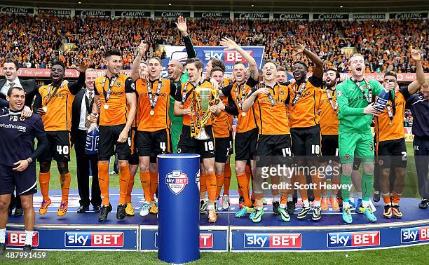 Wolves celebrate as they lift the Sky Bet League One Trophy during the Sky Bet League One match between Wolverhampton Wanderers and Carlisle United...