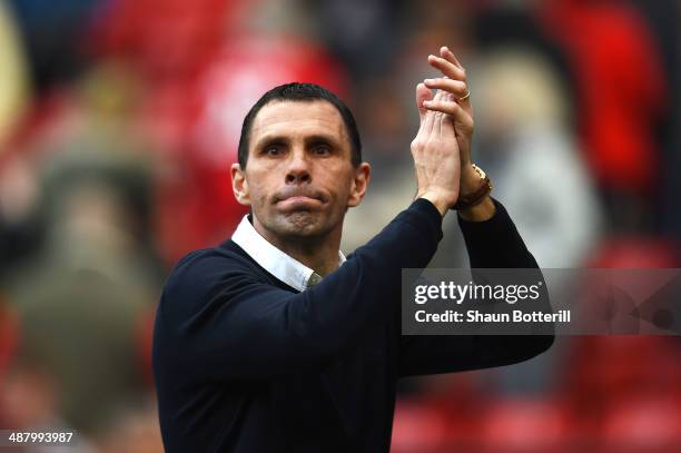 Gustavo Poyet the Sunderland manager celebrates his team's 1-0 victory during the Barclays Premier League match between Manchester United and...