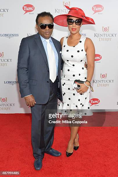 Recording artist Ronald Isley and Kandy Johnson Isley attend 140th Kentucky Derby at Churchill Downs on May 3, 2014 in Louisville, Kentucky.