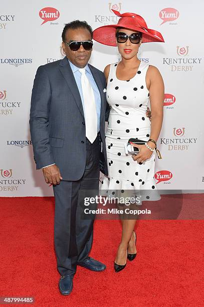 Recording artist Ronald Isley and Kandy Johnson Isley attend 140th Kentucky Derby at Churchill Downs on May 3, 2014 in Louisville, Kentucky.