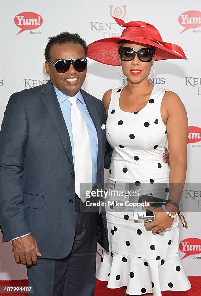 Recording artist Ronald Isley and Kandy Johnson Isley attend 140th Kentucky Derby at Churchill Downs on May 3, 2014 in Louisville, Kentucky.