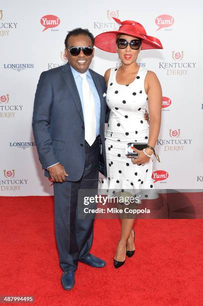 Recording artist Ronald Isley and Kandy Johnson Isley attend 140th Kentucky Derby at Churchill Downs on May 3, 2014 in Louisville, Kentucky.