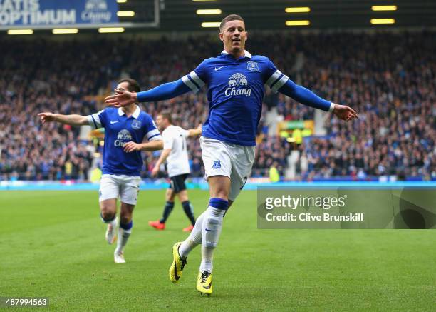Ross Barkley of Everton celebrates scoring the opening goal during the Barclays Premier League match between Everton and Manchester City at Goodison...