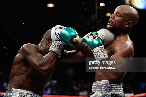 Andre Berto connects with a left to Floyd Mayweather Jr. During their WBC/WBA welterweight title fight at MGM Grand Garden Arena on September 12,...