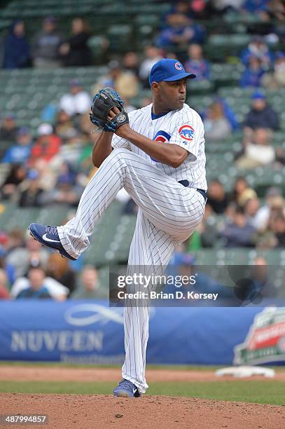 Relief pitcher Jose Veras of the Chicago Cubs pitches during the eighth inning against the Arizona Diamondbacks at Wrigley Field on April 24, 2014 in...