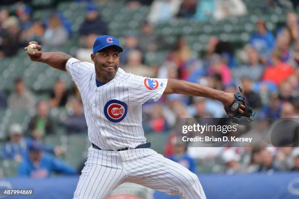 Relief pitcher Jose Veras of the Chicago Cubs pitches during the eighth inning against the Arizona Diamondbacks at Wrigley Field on April 24, 2014 in...