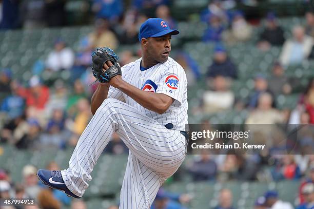 Relief pitcher Jose Veras of the Chicago Cubs pitches during the eighth inning against the Arizona Diamondbacks at Wrigley Field on April 24, 2014 in...