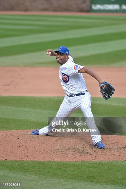 Relief pitcher Jose Veras of the Chicago Cubs pitches during the eighth inning against the Arizona Diamondbacks at Wrigley Field on April 24, 2014 in...