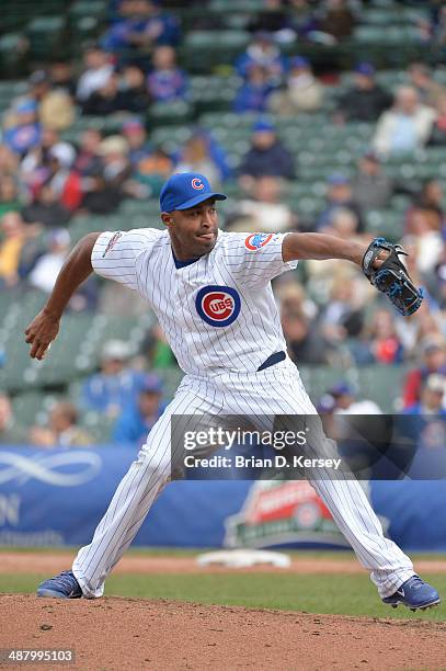 Relief pitcher Jose Veras of the Chicago Cubs pitches during the eighth inning against the Arizona Diamondbacks at Wrigley Field on April 24, 2014 in...