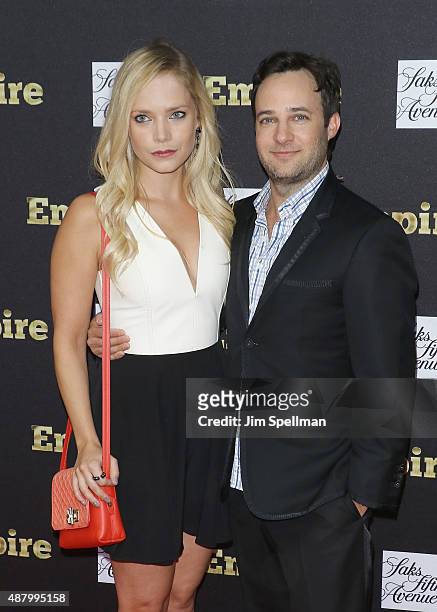 Producer Danny Strong and Caitlin Mehner attend the "Empire" curated collection unveiling at Saks Fifth Avenue on September 12, 2015 in New York City.