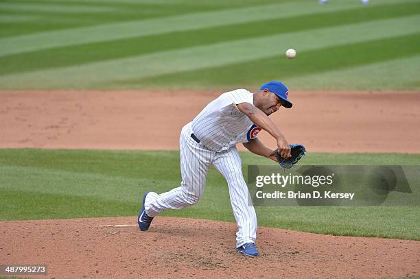 Relief pitcher Jose Veras of the Chicago Cubs pitches during the eighth inning against the Arizona Diamondbacks at Wrigley Field on April 24, 2014 in...