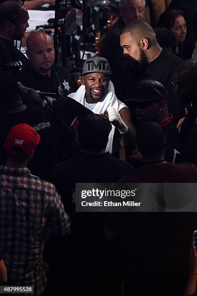 Floyd Mayweather Jr. Walks out of the arena after his unanimous-decision win over Andre Berto in their WBC/WBA welterweight title fight at MGM Grand...