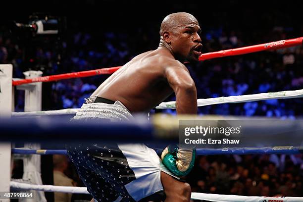 Floyd Mayweather Jr. Plays to the crowd during his WBC/WBA welterweight title fight against Andre Berto at MGM Grand Garden Arena on September 12,...