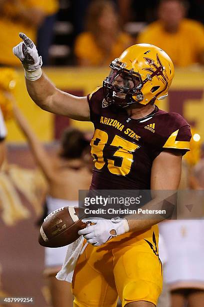 Tight end Kody Kohl of the Arizona State Sun Devils celebrates after scoring on a 10 yard touchdown reception against the Cal Poly Mustangs during...