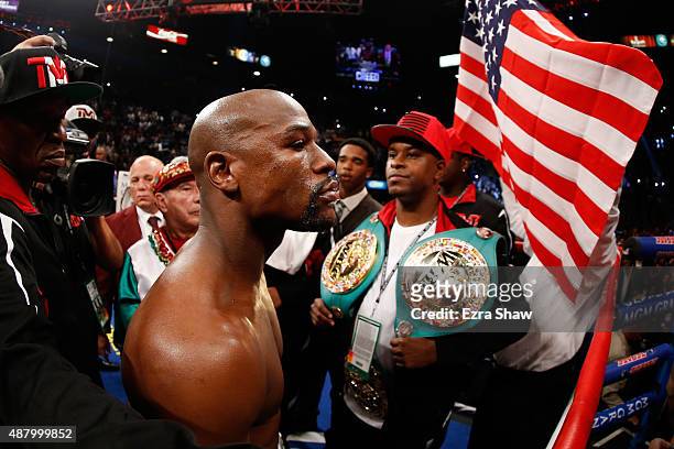 Floyd Mayweather Jr. Stands in the ring prior to his WBC/WBA welterweight title fight against Andre Berto at MGM Grand Garden Arena on September 12,...
