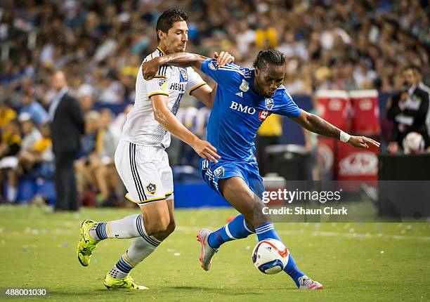 Didier Drogba of Montreal Impact battles Omar Gonzalez of Los Angeles Galaxy during Los Angeles Galaxy's MLS match against Montreal Impact at the...