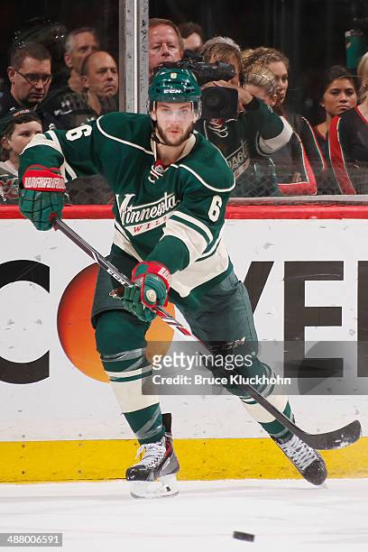 Marco Scandella of the Minnesota Wild passes the puck against the Colorado Avalanche during Game Six of the First Round of the 2014 Stanley Cup...