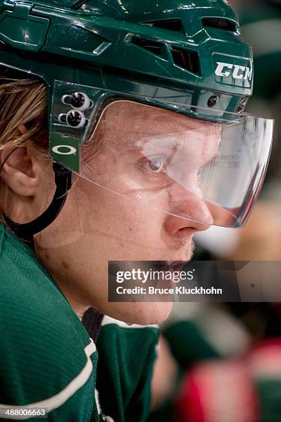 Mikael Granlund of the Minnesota Wild watches from the bench against the Colorado Avalanche during Game Six of the First Round of the 2014 Stanley...