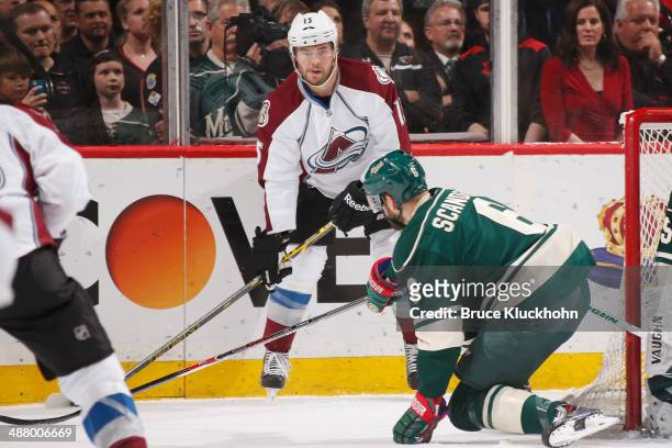 Marco Scandella of the Minnesota Wild defends P.A. Parenteau of the Colorado Avalanche during Game Six of the First Round of the 2014 Stanley Cup...