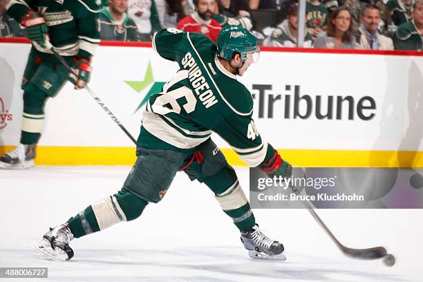 Jared Spurgeon of the Minnesota Wild shoots the puck against the Colorado Avalanche during Game Six of the First Round of the 2014 Stanley Cup...