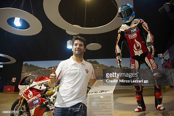 Carlos Checa of Spain poses in the museum near his bike during the MotoGp of Spain - Qualifying at Circuito de Jerez on May 3, 2014 in Jerez de la...