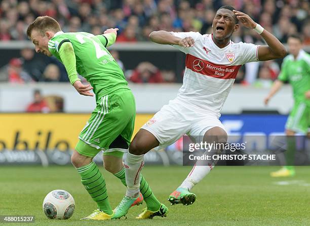 Wolfsburg's midfielder Maximilian Arnold and Stuttgart's Ecuadorian midfielder Carlos Gruezo vie for the ball during the German first division...