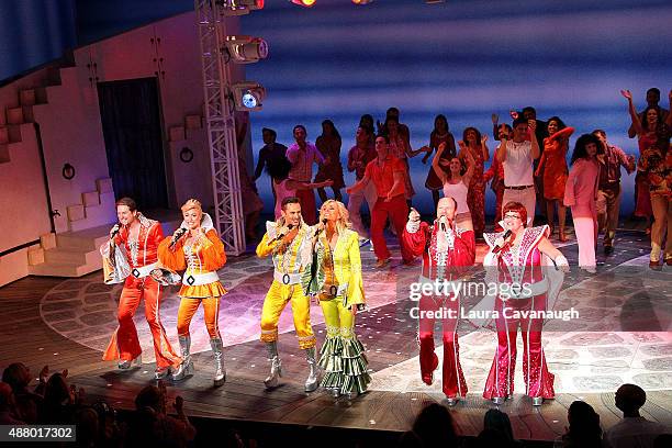 Paul DeBoy, Allison Ewing, Victor Wallace, Judy McLane, John Hemphill and Mary Callanan and the cast of "Mamma Mia!" perform during the final...