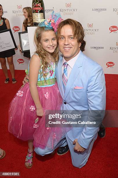 Dannielynn Birkhead and Larry Birkhead toasts with Moet & Chandon at the 140th Kentucky Derby at Churchill Downs on May 3, 2014 in Louisville,...