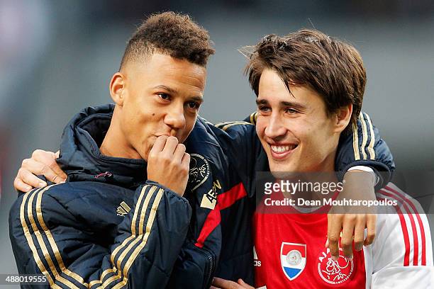 Tobias Sana and Bojan Krkic of Ajax embrace after the Eredivisie match between Ajax Amsterdam and NEC Nijmegen at Amsterdam Arena on May 3, 2014 in...