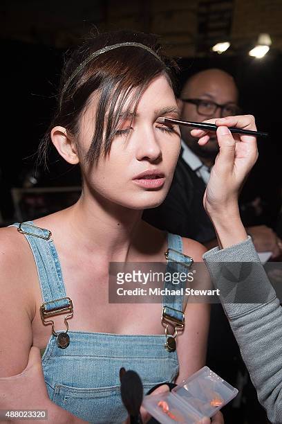 Model Mick Szal prepares before the Son Jung Wan fashion show during Spring 2016 New York Fashion Week at The Dock, Skylight at Moynihan Station on...