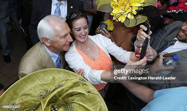 Kentucky Gov. Steve Beshear had a selfie taken with Cherish Denton, of Henderson, Ky., before the 140th running of the Kentucky Derby at Churchill...