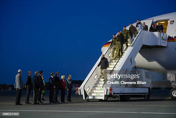 Freed OSCE observers, amogst them Axel Schneider arrive by plane, awaited by Danish Defense Minister Nicolai Wammen , Czech Defense Minister Martin...