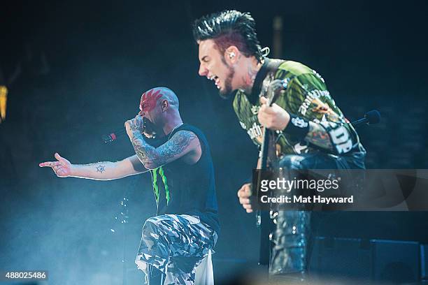 Ivan Moody and Jason Hook of Five Finger Death Punch performs at Xfinity Arena on September 12, 2015 in Everett, Washington.