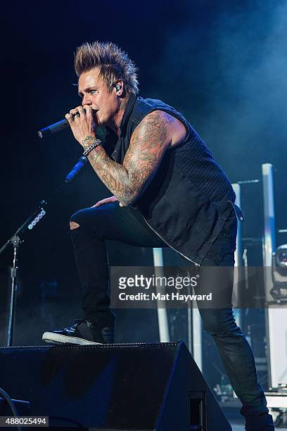 Jacoby Shaddix of Papa Roach performs on stage at Xfinity Arena on September 12, 2015 in Everett, Washington.