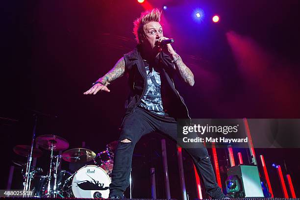 Jacoby Shaddix of Papa Roach performs on stage at Xfinity Arena on September 12, 2015 in Everett, Washington.