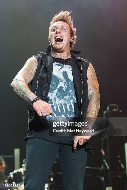 Jacoby Shaddix of Papa Roach performs on stage at Xfinity Arena on September 12, 2015 in Everett, Washington.