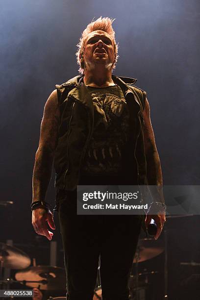 Jacoby Shaddix of Papa Roach performs on stage at Xfinity Arena on September 12, 2015 in Everett, Washington.