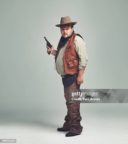 wanna make something of it? - calça de couro de cowboy imagens e fotografias de stock