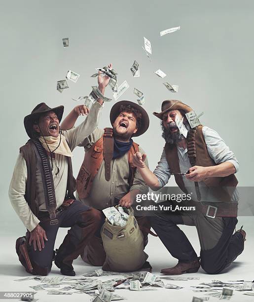 we're rich!! no more cattle rustling for us! - stealing idea stock pictures, royalty-free photos & images