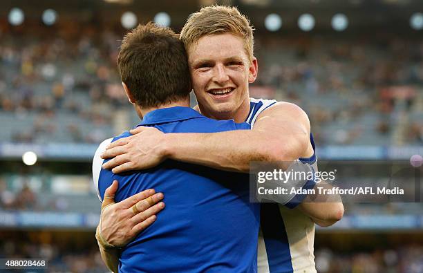 Brad Scott, Senior Coach of the Kangaroos congratulates Jack Ziebell of the Kangaroos after the 2015 AFL First Elimination Final match between the...