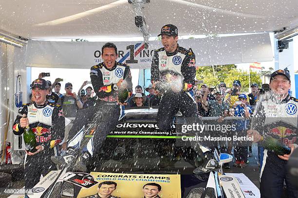 Sebastien Ogier of France and Julien Ingrassia of France celebrate their victory in the rally and their third World Rally Championship Title during...