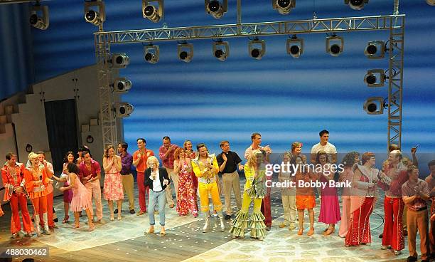 Producer Judy Craymer, Paul DeBoy, Alison Ewing, Victor Wallace, Judy McLane, John Hemphill and Mary Callanan and the cast perform "Mamma Mia!"...