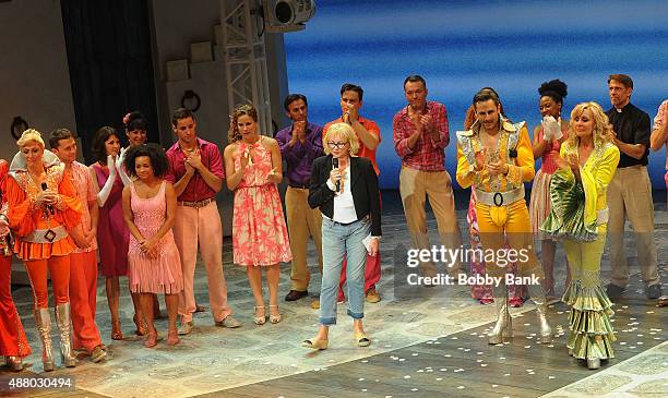Producer Judy Craymer, Paul DeBoy, Alison Ewing, Victor Wallace, Judy McLane, John Hemphill and Mary Callanan and the cast perform "Mamma Mia!"...