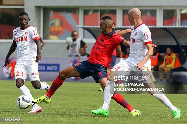 Ajaccio's French forward Khalid Boutaid vies with Monaco's Italian defender Andrea Raggi during the French L1 football match between GFC Ajaccio and...
