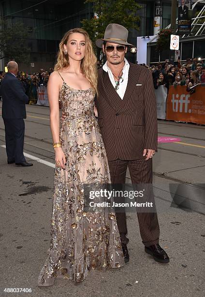 Actress Amber Heard and actor Johnny Depp attend 'The Danish Girl' premiere during the 2015 Toronto International Film Festival at the Princess of...